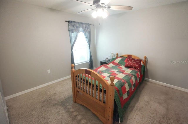 bedroom featuring carpet, ceiling fan, and baseboards