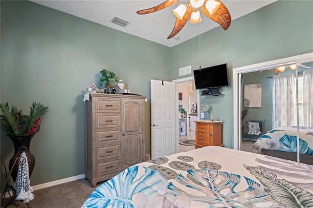 bedroom featuring carpet floors, a ceiling fan, visible vents, and baseboards