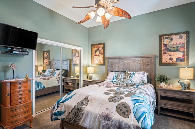 carpeted bedroom with ceiling fan and a closet