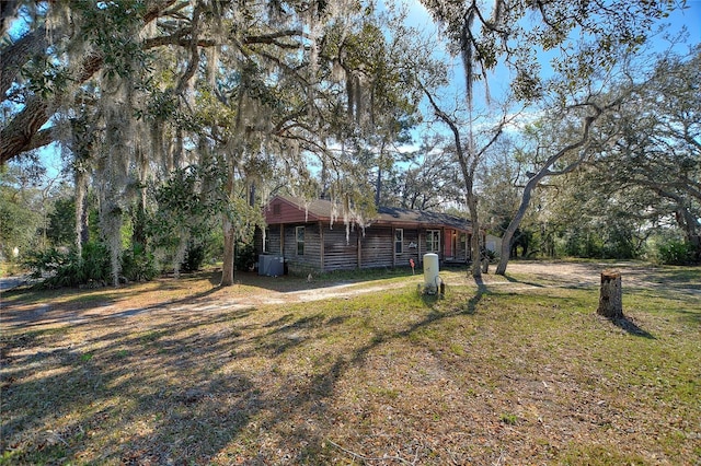 exterior space featuring a front lawn