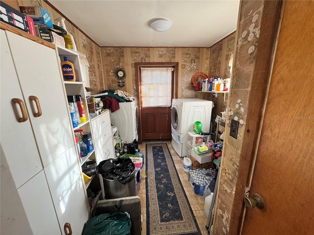 clothes washing area with laundry area and independent washer and dryer