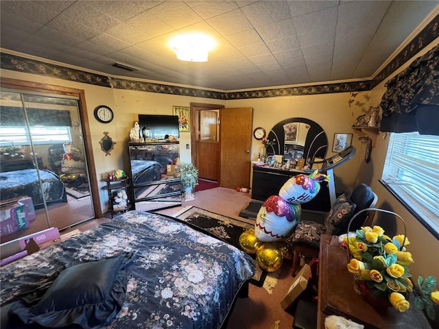 bedroom with access to outside and visible vents