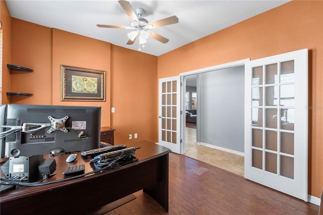 office with ceiling fan, baseboards, wood finished floors, and french doors