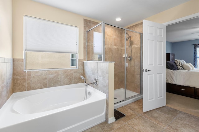 full bath featuring a bath, a stall shower, tile patterned flooring, and connected bathroom