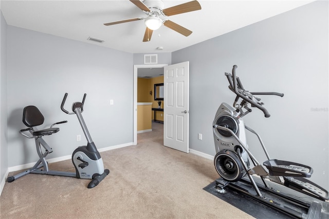 workout area with a ceiling fan, baseboards, visible vents, and carpet flooring