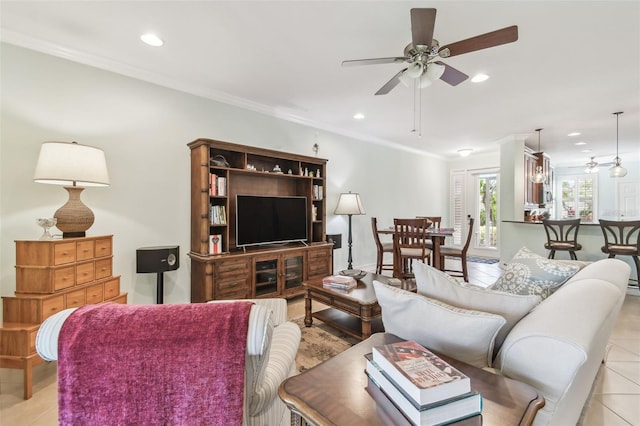 living room featuring light tile patterned flooring, ceiling fan, ornamental molding, and recessed lighting