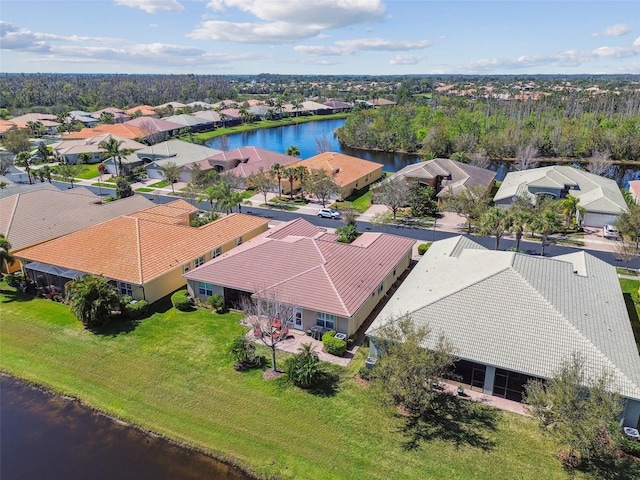 aerial view with a water view and a residential view