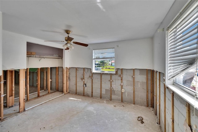 unfurnished room featuring a ceiling fan