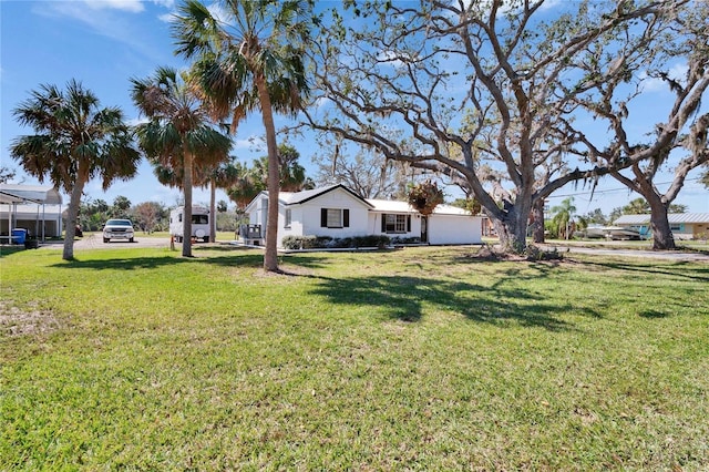 view of front of home with a front yard