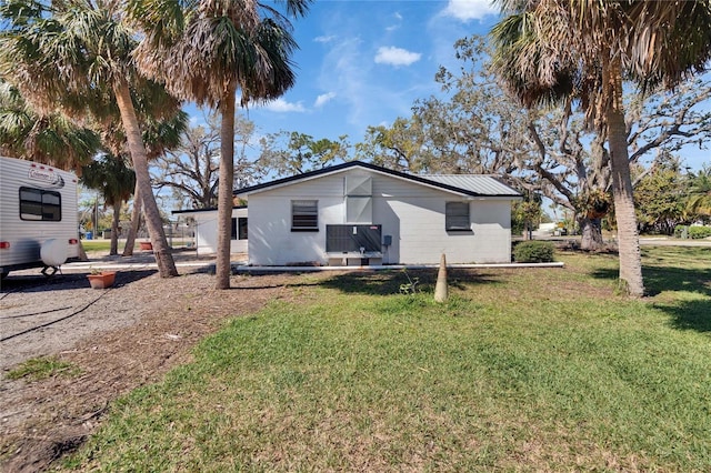 view of property exterior featuring a yard