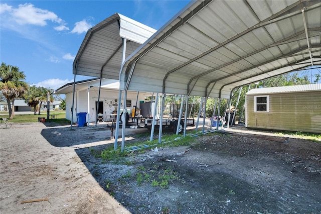 view of parking featuring a carport