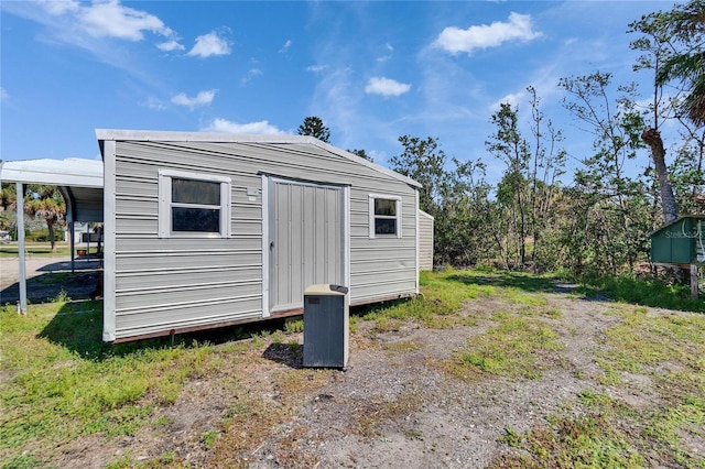 view of outbuilding with an outdoor structure