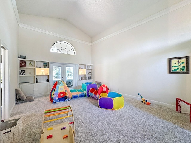 rec room with high vaulted ceiling, french doors, carpet flooring, and baseboards