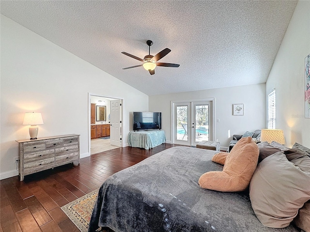 bedroom with a textured ceiling, hardwood / wood-style flooring, access to exterior, vaulted ceiling, and french doors