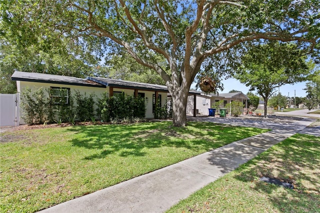 ranch-style house featuring stucco siding