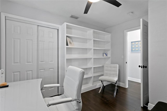 home office featuring ceiling fan, baseboards, and dark wood-style floors