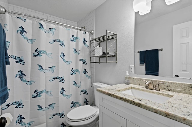 full bath featuring toilet, vanity, a textured wall, and curtained shower
