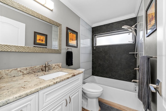 bathroom featuring toilet, vanity, ornamental molding, and shower / bathtub combination