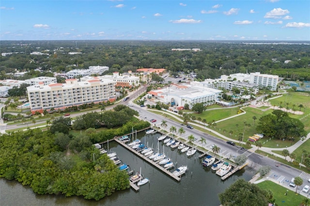 drone / aerial view with a view of city and a water view