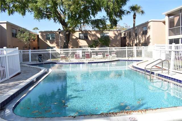 pool featuring fence