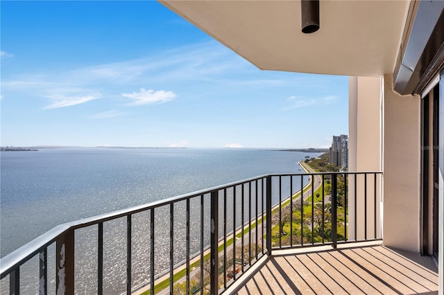 balcony featuring a water view