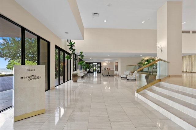 building lobby with visible vents and stairs