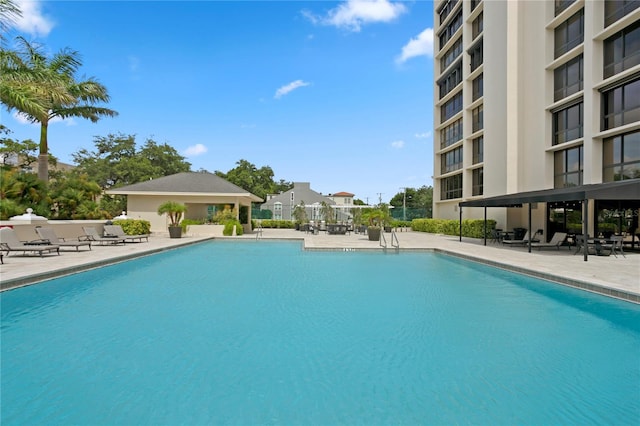 community pool with a patio