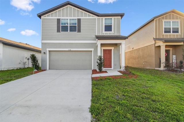 view of front of property featuring stucco siding, board and batten siding, a garage, driveway, and a front lawn