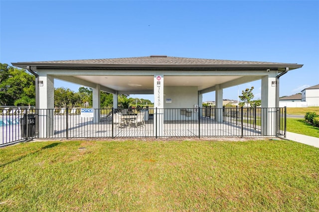 exterior space featuring fence, a lawn, and a patio