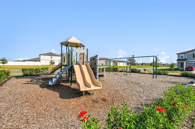 community playground featuring a residential view