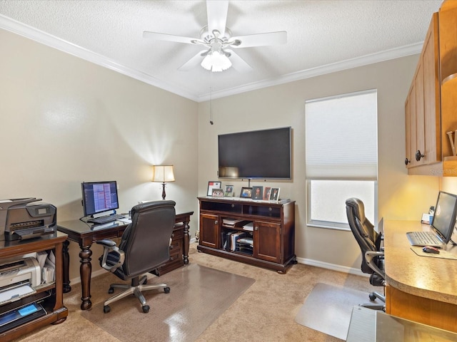 home office featuring ceiling fan, a textured ceiling, light colored carpet, baseboards, and crown molding