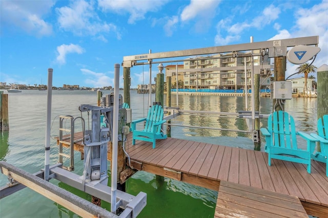 dock area featuring a water view and boat lift