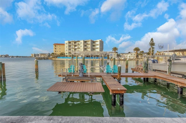 dock area with a water view and boat lift