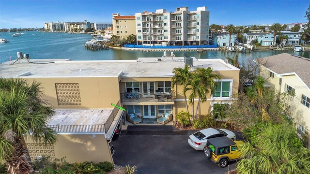 view of property with a water view