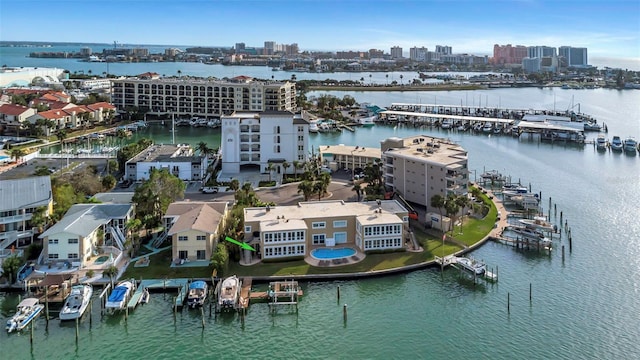 bird's eye view featuring a water view and a view of city