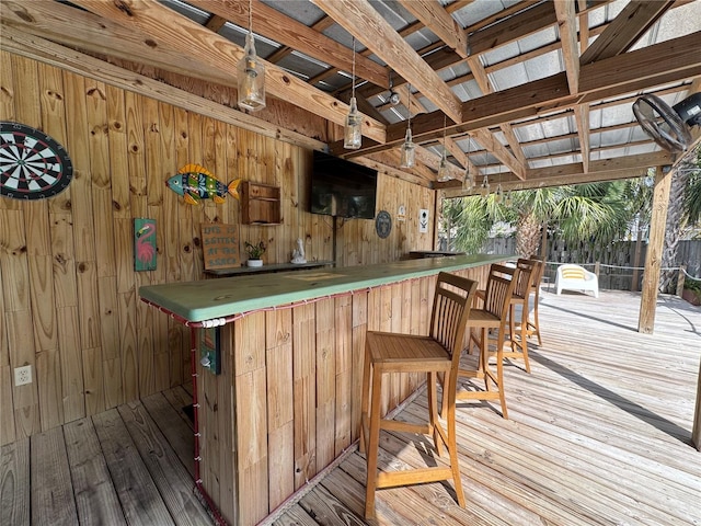 wooden deck with outdoor dry bar