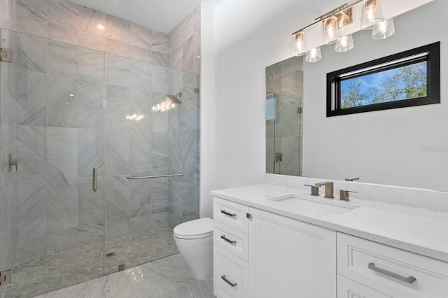 full bath featuring toilet, a shower stall, and vanity
