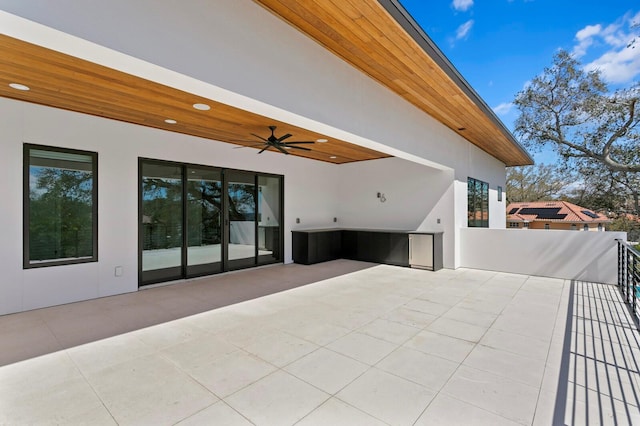 view of patio / terrace featuring ceiling fan
