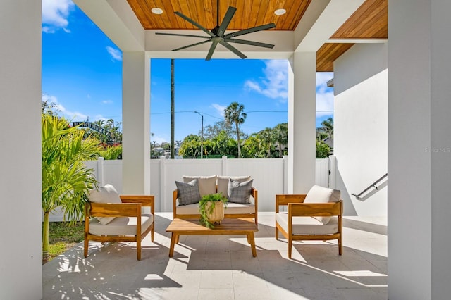 view of patio / terrace with ceiling fan, an outdoor hangout area, and a fenced backyard