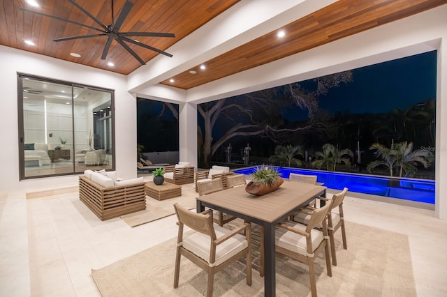 view of patio / terrace with an outdoor pool, outdoor dining area, outdoor lounge area, and a ceiling fan