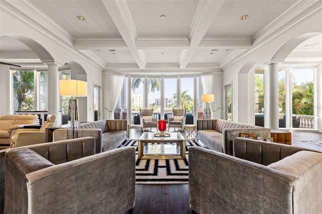 living room with a wealth of natural light, dark wood-type flooring, beamed ceiling, and coffered ceiling