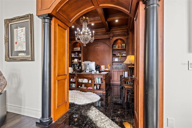 wine room with baseboards, coffered ceiling, built in features, arched walkways, and beamed ceiling