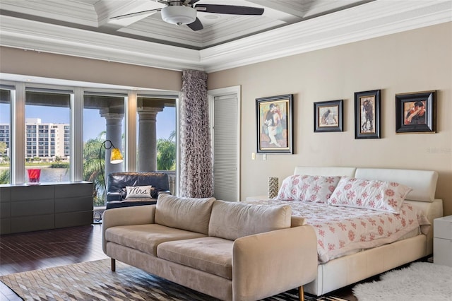 bedroom featuring coffered ceiling, a ceiling fan, ornamental molding, wood finished floors, and access to exterior