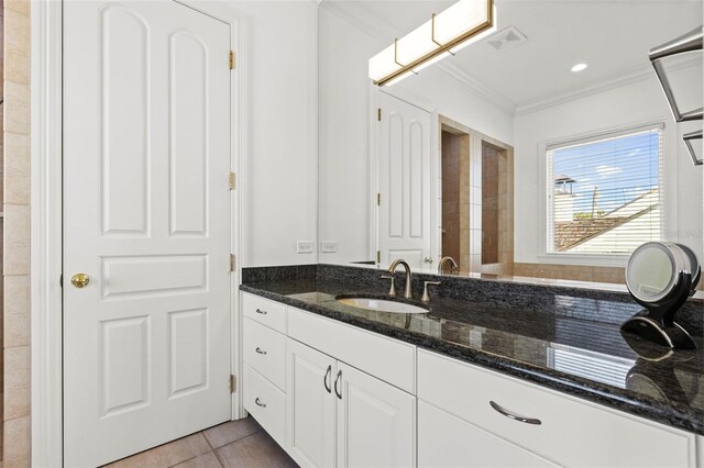 bathroom with ornamental molding, recessed lighting, vanity, and tile patterned floors