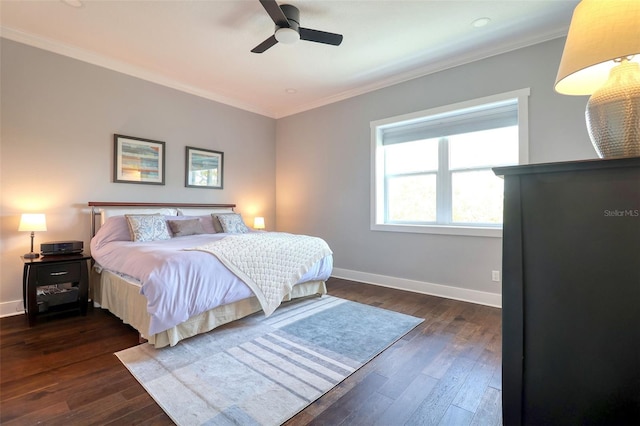 bedroom with ceiling fan, baseboards, ornamental molding, and dark wood finished floors