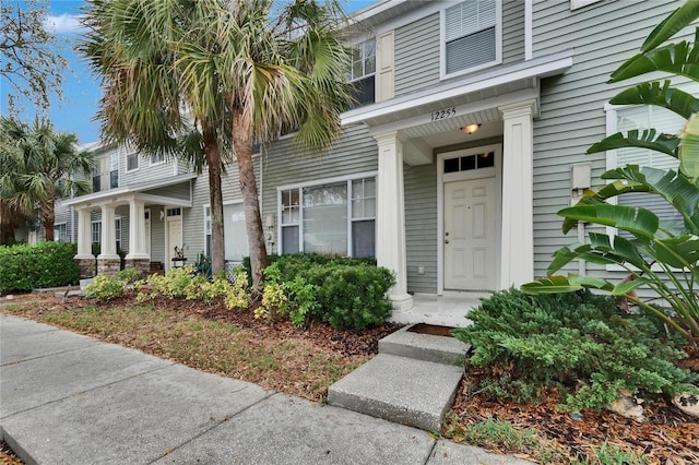 entrance to property with covered porch