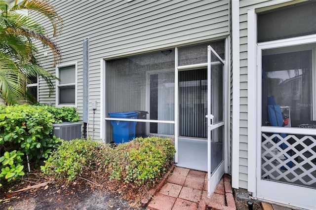 doorway to property with central AC