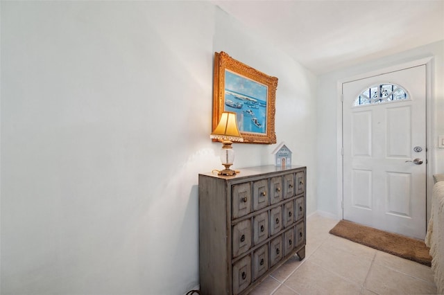 foyer with light tile patterned floors