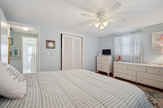 bedroom featuring a ceiling fan and a closet