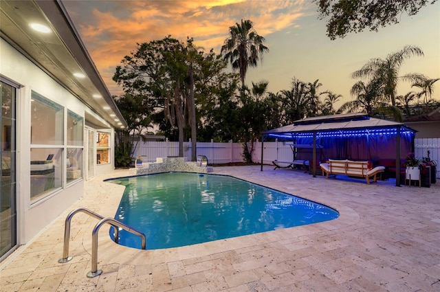 view of pool with a fenced in pool, a patio, a fenced backyard, and outdoor lounge area